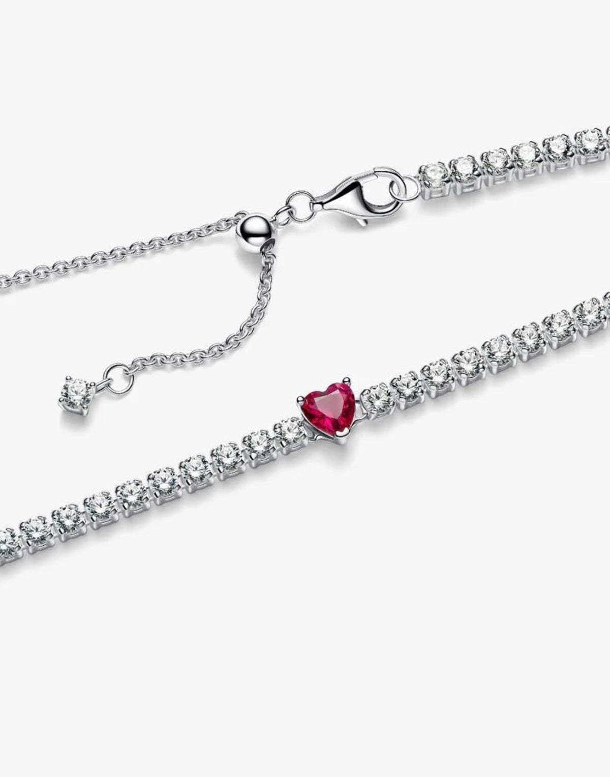 Red heart tennis necklace with clear CZ stones and red heart centerpiece, adjustable lobster clasp